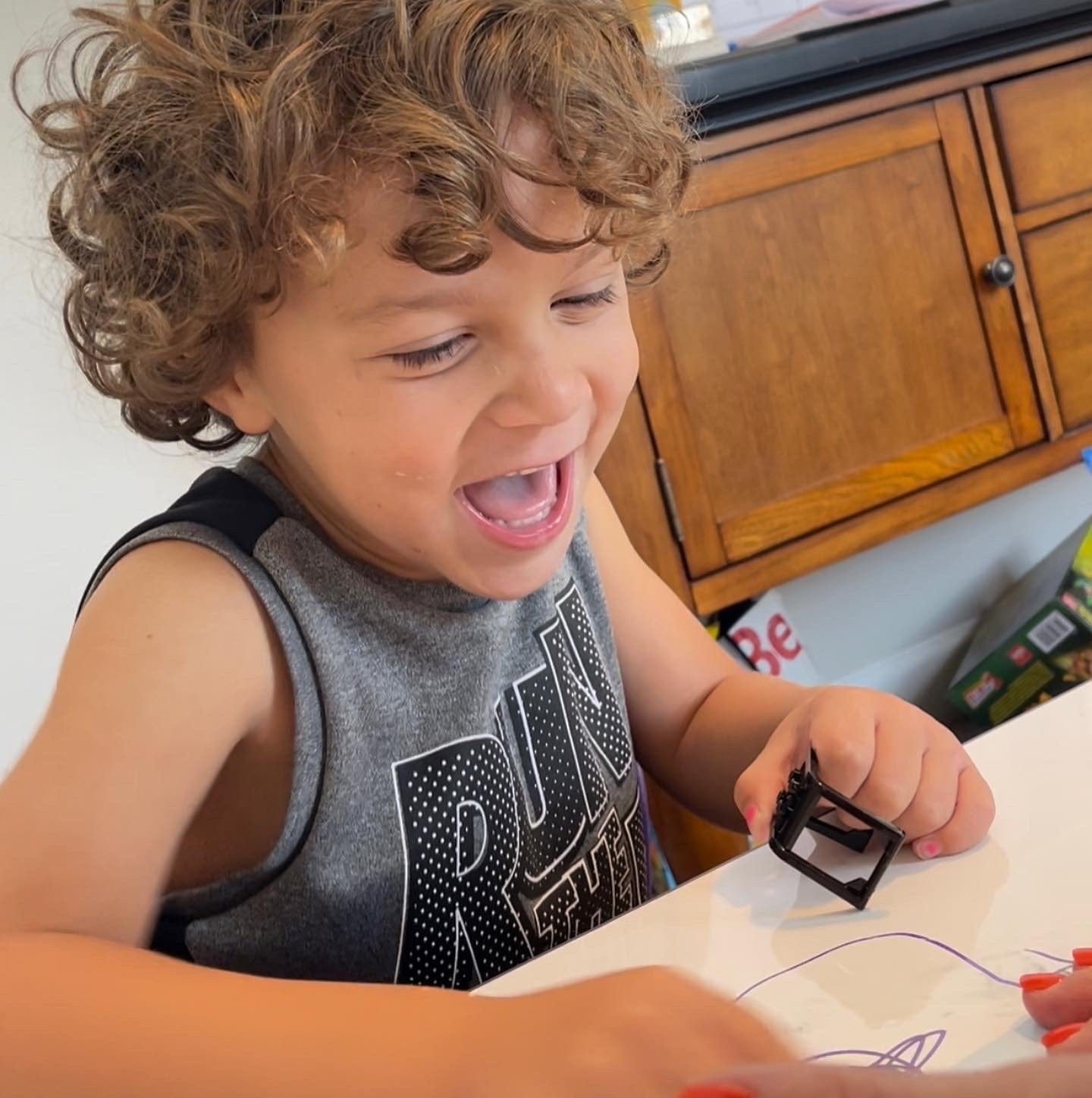 Happy child playing, image 7C2633E0-CAB9-456B-BF53-2B775D00F79F