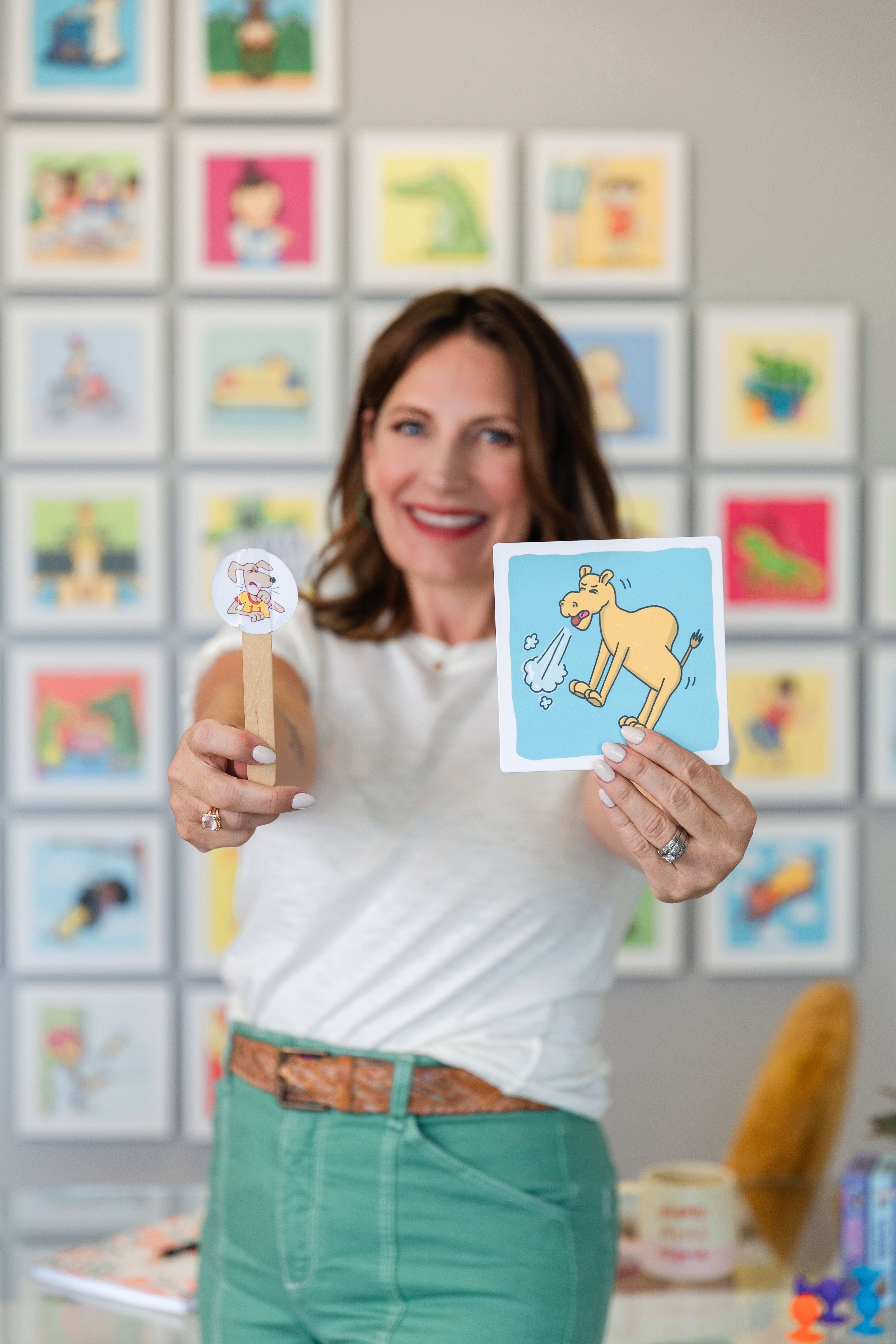 woman holding camel illustration