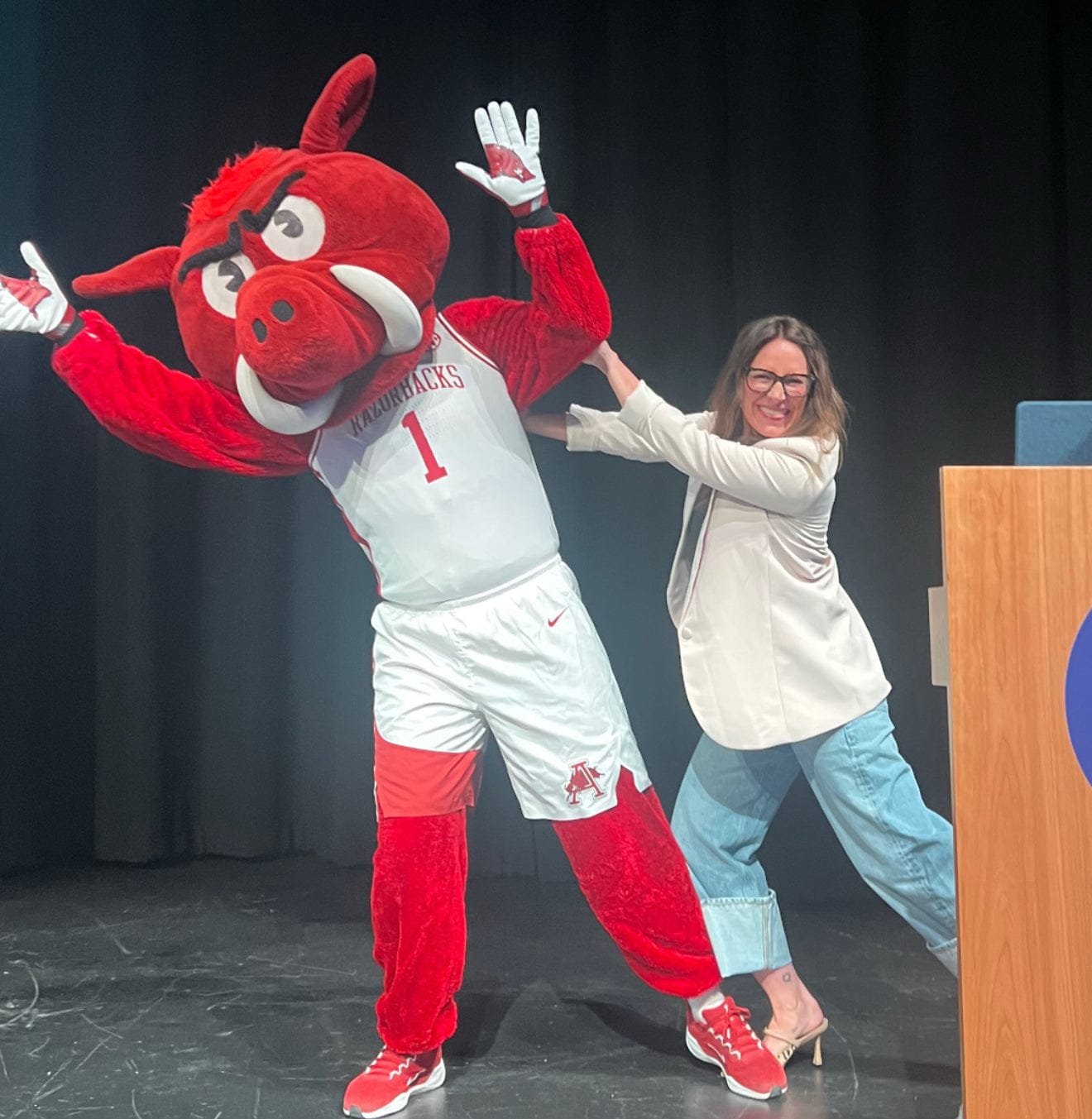 Arkansas Razorbacks mascot with woman