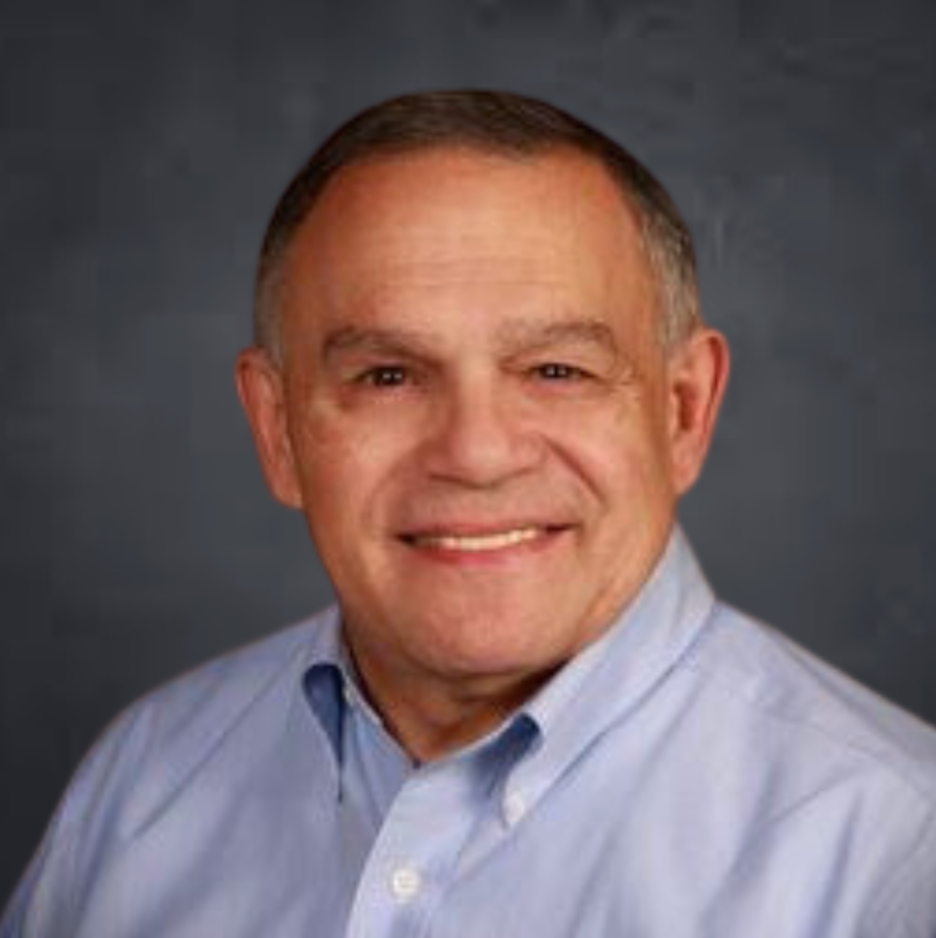 Lou's Headshot - Smiling Man in Blue Shirt
