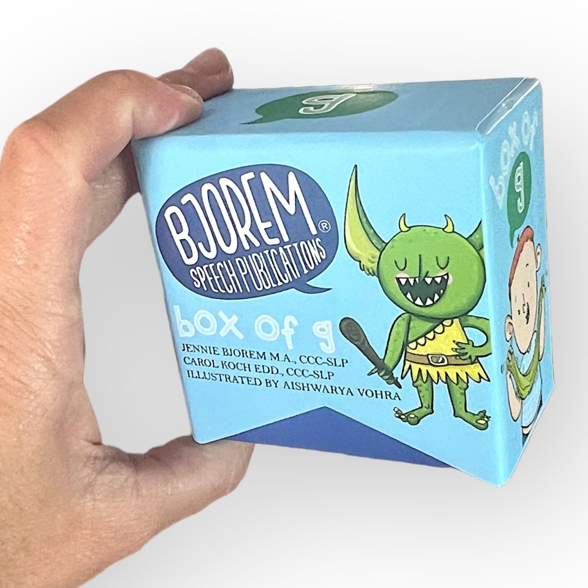 Bjorem Speech Publications box of g held by hand