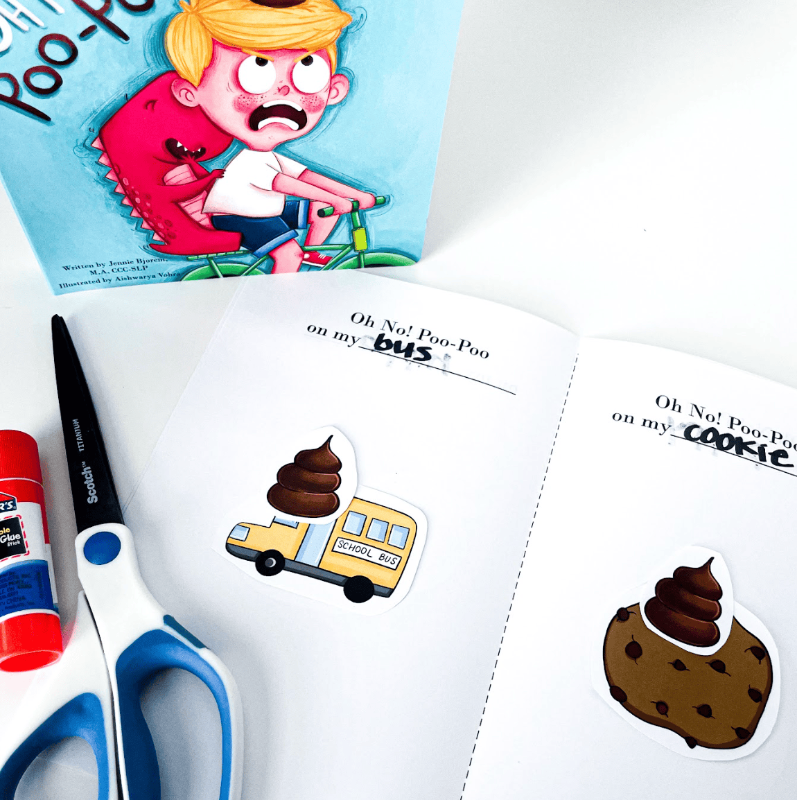 Screenshot of Oh No! Poo-Poo book with bus and cookie illustrations.