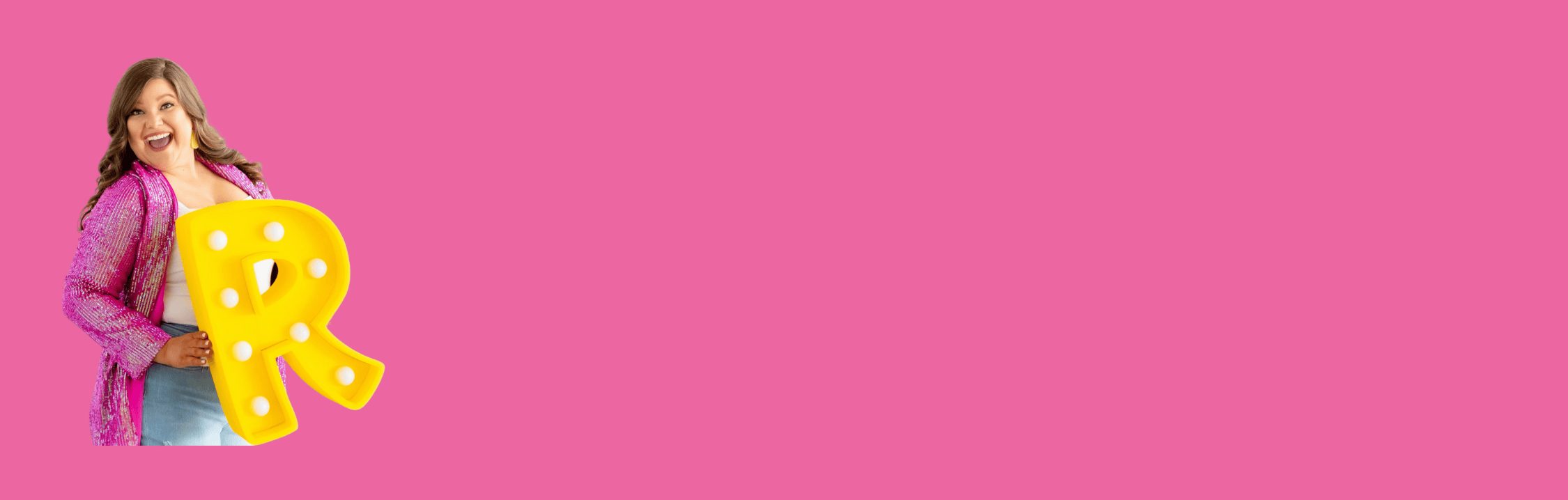 Woman holding yellow R on pink background, screenshot from 2025.