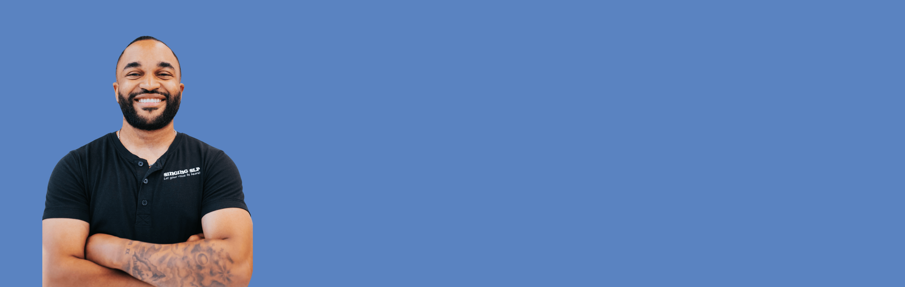 Smiling man in black shirt, screenshot from August 14, 2025.