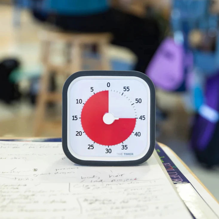 Time Timer TTM9-W in a school setting, showing 15 minutes remaining.