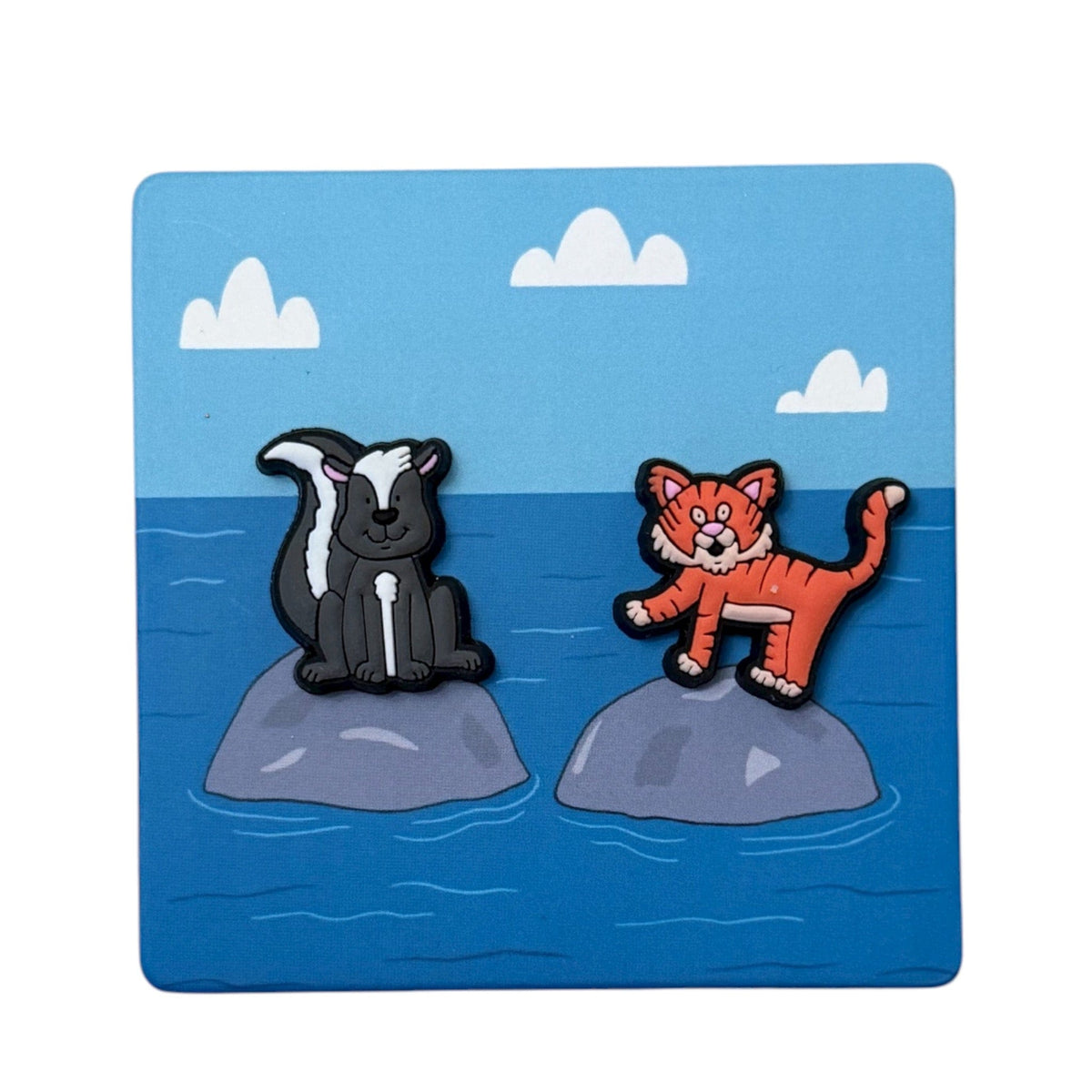 Spatial Concepts minis of a skunk and cat placed on a scene card