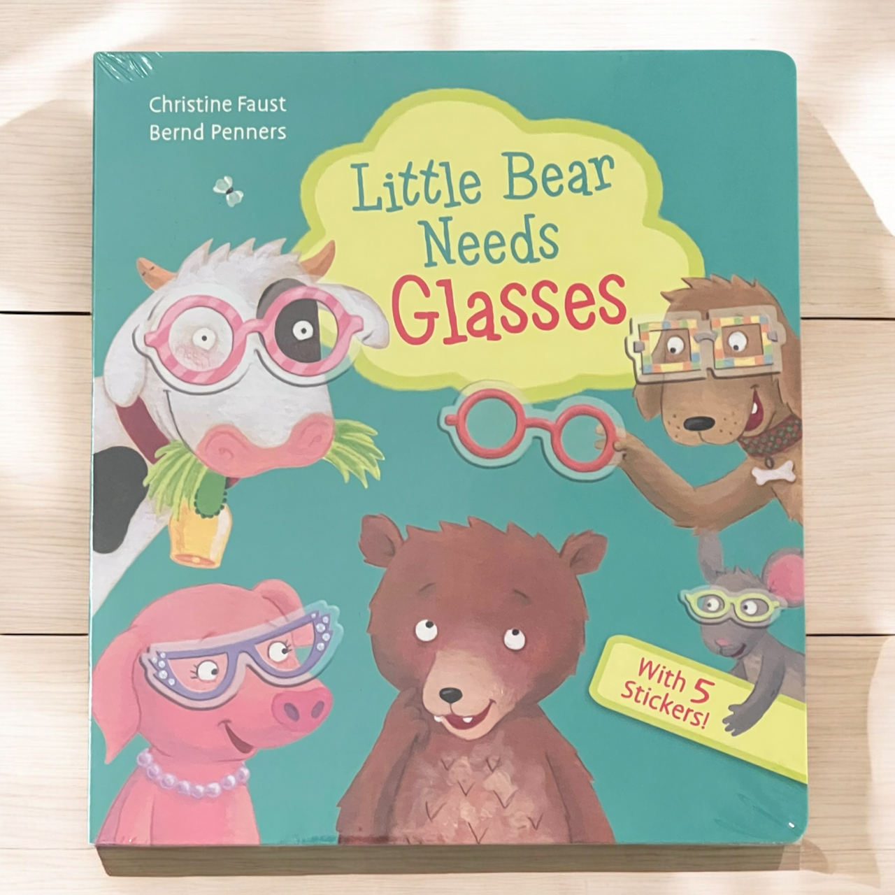 Little Bear Needs Glasses Board Book with Reusable Stickers
