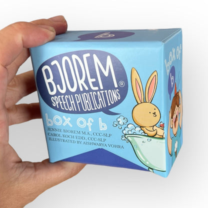 Box of B held in hand to show size