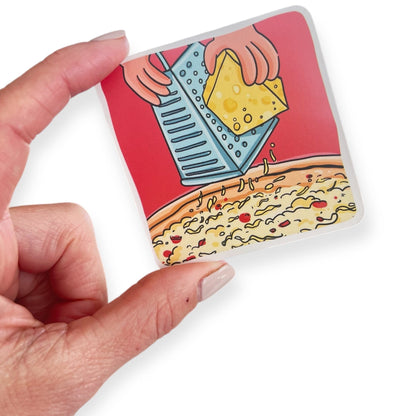 Picture card of cheese being grated from the CH, SH and J bundle