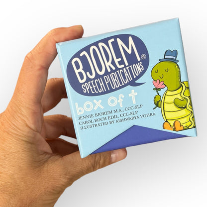 Box of T held in hand to show size