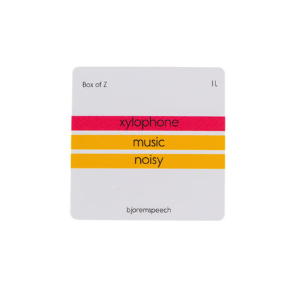Back of a Box of Z card with words like xylophone, music and nosy