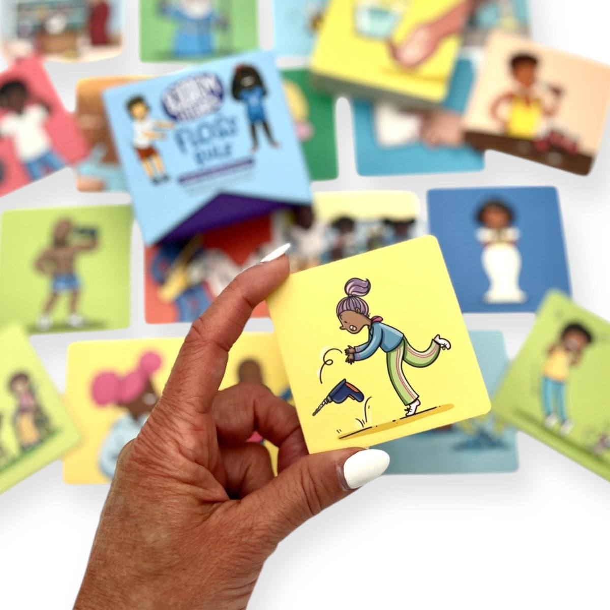 Floss Rule cards held in hand