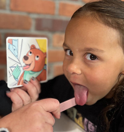 Child imitating a tongue movement from the Oral Motor Assessment